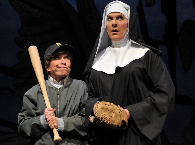 A young boy (Ellen Colton, left) turns to the Mother Superior (Jeffery Roberson aka Varla Jean Merman, right) for help with his baseball skills in a scene from the SpeakEasy Stage Company production of &quot;The Divine Sister,&quot; running now thru Nov. 19. (Courtesy of Craig Bailey/Perspective Photo) 