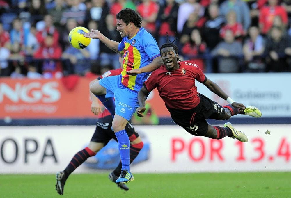 Levante's Asier Del Horno duels for the ball with Osasuna's Ibrahima Balde during their Spanish La Liga soccer match in Pamplona on Sunday. Levante lost the match 2-0. (AP)