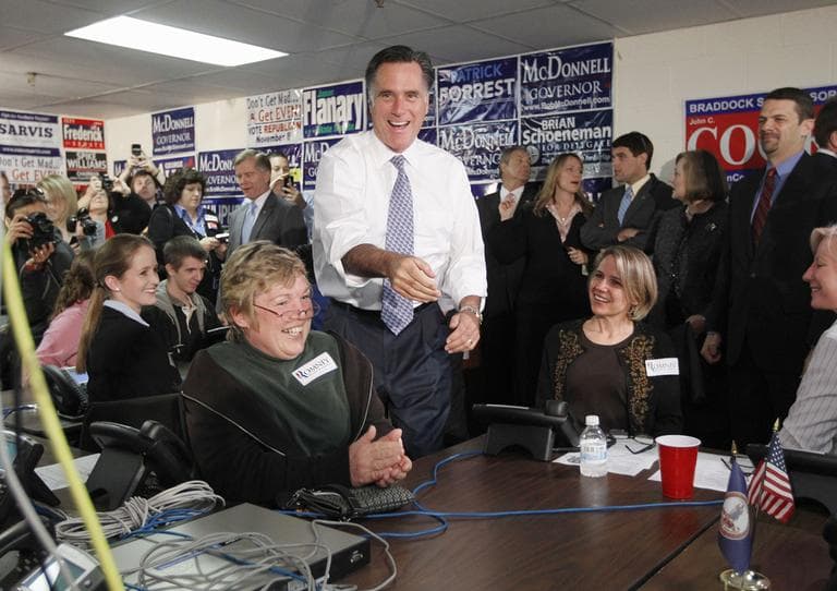 Republican presidential candidate, former Massachusetts Gov. Mitt Romney, greets volunteers at a call center at the Fairfax County Republican Committee (FCRC) headquarters in Fairfax. Va., Wednesday, Oct. 26, 2011. (AP)