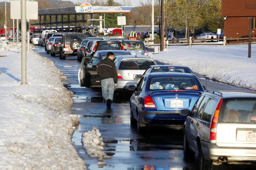 Motorists wait in line for gas at a rest area on the Massachusetts Turnpike eastbound in Charlton, Mass., Sunday. (AP) 