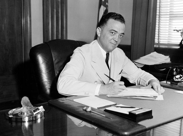F.B.I. director J. Edgar Hoover is seen in his Washington office, date unknown. (AP)
