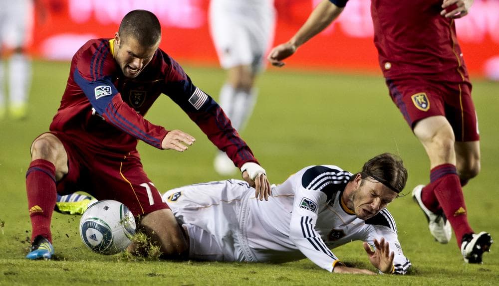L.A. Galaxy midfielder David Beckham is fouled by Real Salt Lake midfielder Javier Morales during the MLS Western Conference Championship last Sunday. The Galaxy will take on Huston in the championship game. (AP)