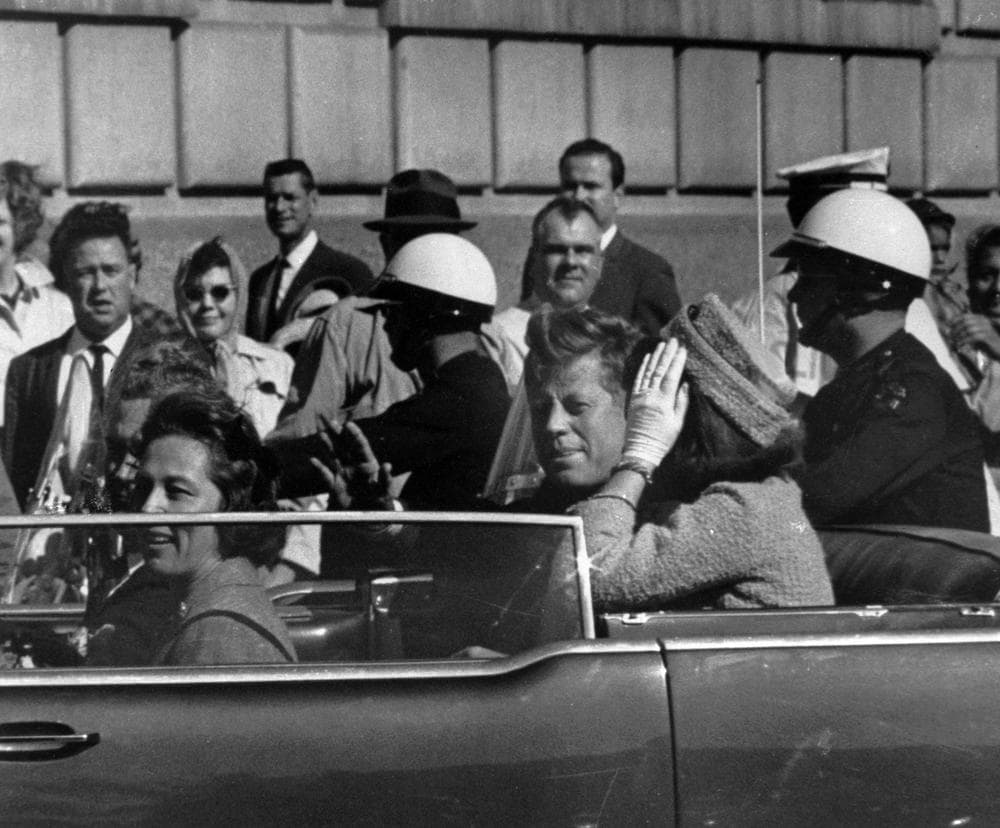 President John F. Kennedy is seen riding in motorcade approximately one minute before he was shot in Dallas, Tx., on Nov. 22, 1963. (AP)