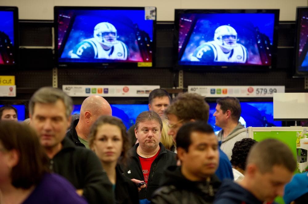 Shoppers wait in line to purchase electronic items on sale a Target store in Roswell, Ga., Friday Nov. 25, 2011.  (AP)