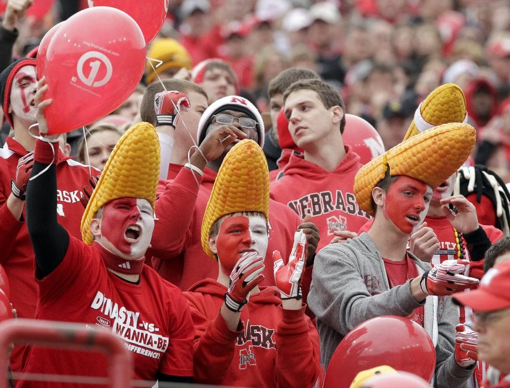 Nebraska fans cheer in the first half of the game against Iowa on Friday. (AP)