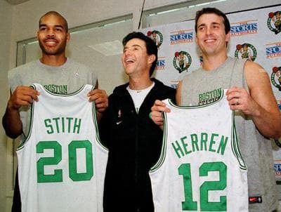 Boston Celtics' head coach Rick Pitino, center, shares a light moment with newly acquired Celtics players Bryant Stith, left, and Chris Herren, right, in 2000. (AP)