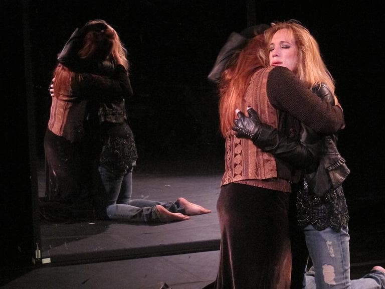 The Oedipus complex is at work in this scene, where a lesbian Hamlet embraces Ophelia. (Andrea Shea/WBUR)
