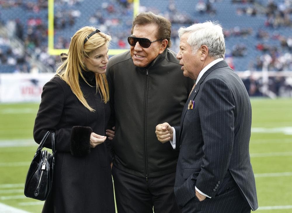 New England Patriots owner Robert Kraft, right, hosts casino mogul Steve Wynn and his wife, Andrea Hissom, on the field at Gillette Stadium prior to the Patriots' NFL football game against the Indianapolis Colts in Foxborough, Mass., Sunday. (AP)