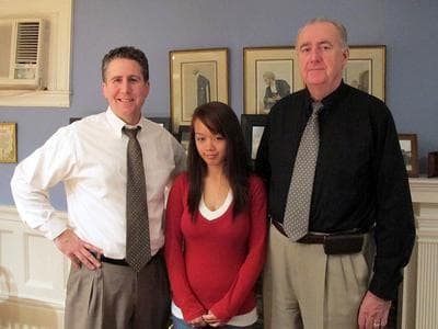 Nga Truong, with lawyers Jeff Richards, left, and Ed Ryan, on Monday. Ryan has called Truong's 2008 interrogation by Worcester police &quot;psychological torture.&quot; (Lisa Tobin/WBUR)