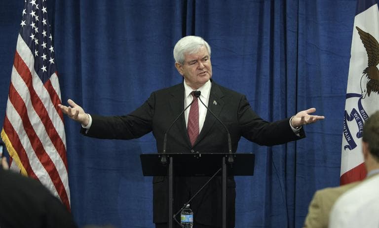 In this Dec. 1, 2011, file photo, Republican presidential candidate, former House Speaker Newt Gingrich speaks during a meeting with employees at Nationwide Insurance in Des Moines, Iowa. If there’s any one reason that might explain Gingrich’s sharp rise in the polls in Iowa, it’s this: Republicans in the state are aching for an attack dog to go after President Barack Obama. (AP)