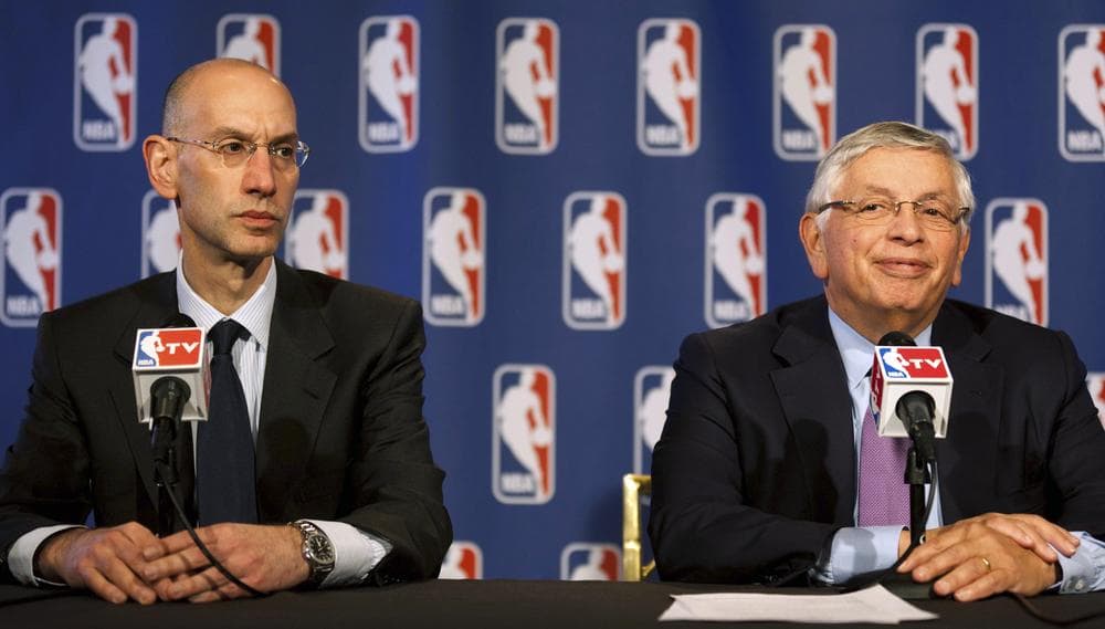 NBA Commissioner David Stern smiles during a news conference alongside Deputy Commissioner Adam Silver following the ratification of a new collective bargaining agreement on Thursday. (AP)