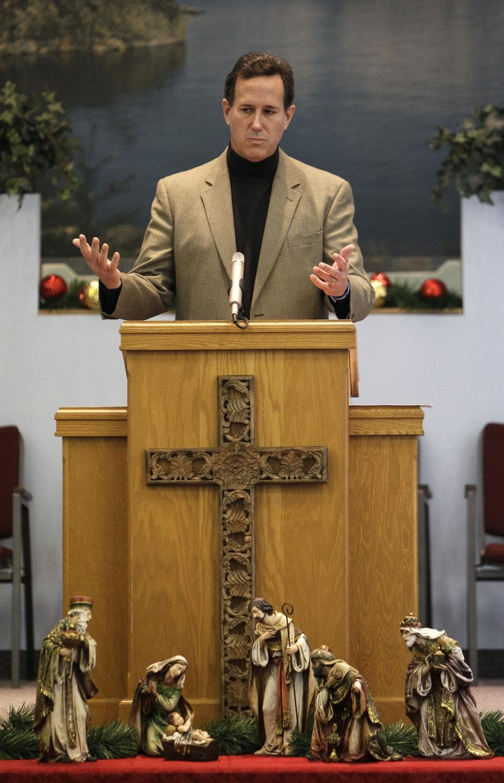 Republican presidential hopeful former Pennsylvania Senator Rick Santorum speaks at the Tabernacle Baptist Church, Sunday in Coralville, Iowa. (AP)