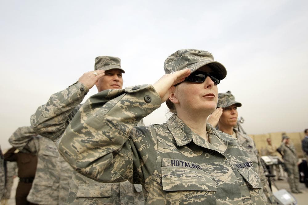 US Army soldiers salute during ceremonies marking the end of US military mission in Baghdad, Iraq, Thursday. (AP)
