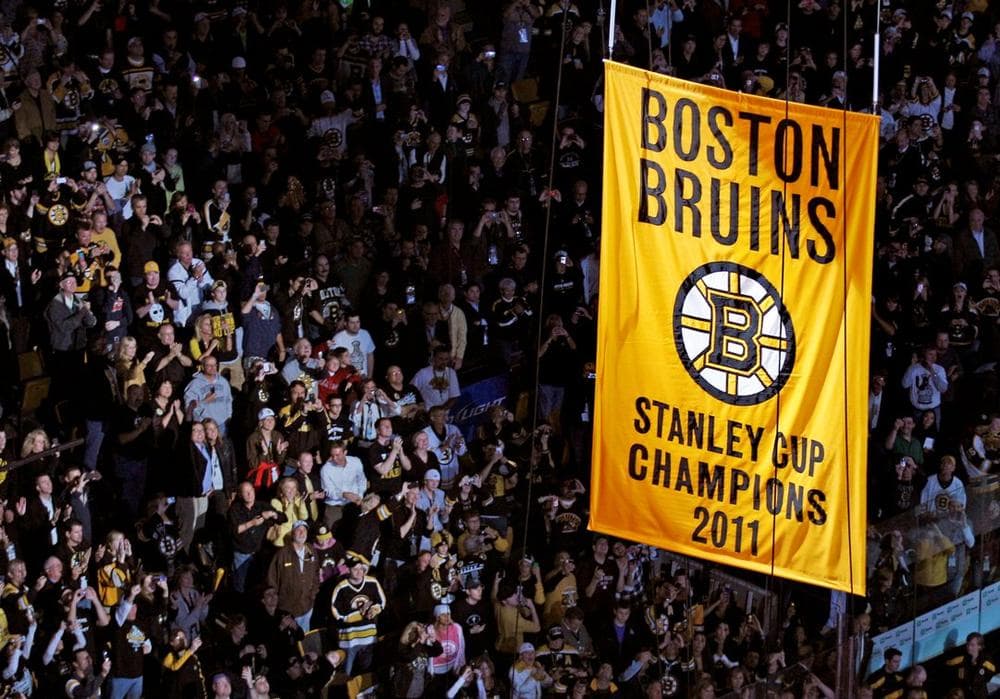The Bruins raised the 2011 championship banner to the rafters of the TD Garden, Oct. 6. (AP)