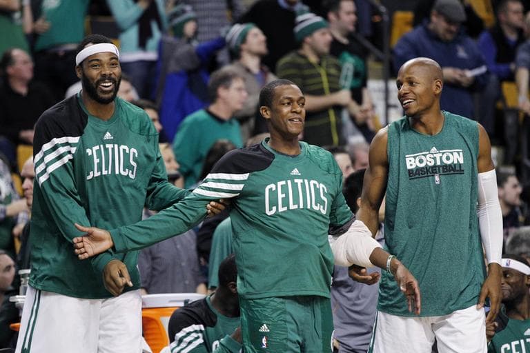 From left, Boston Celtics forward Chris Wilcox, guard Rajon Rondo and guard Ray Allen watch from the bench during the second half of an NBA preseason basketball game against the Toronto Raptors in Boston, Wednesday, Dec. 21. (AP)