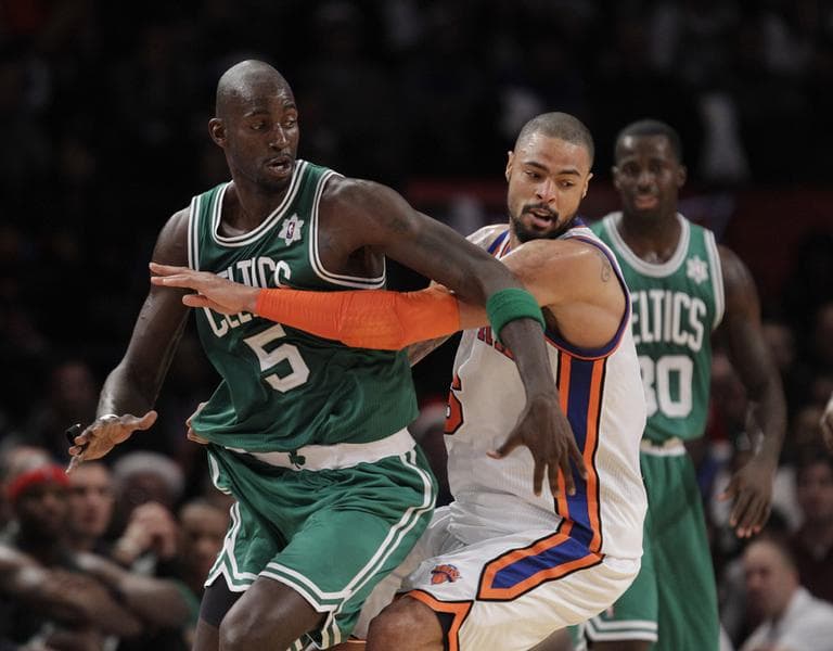 New York Knicks center Tyson Chandler defends against Boston Celtics forward Kevin Garnett during Sunday&#039;s game at Madison Square Garden. (AP)