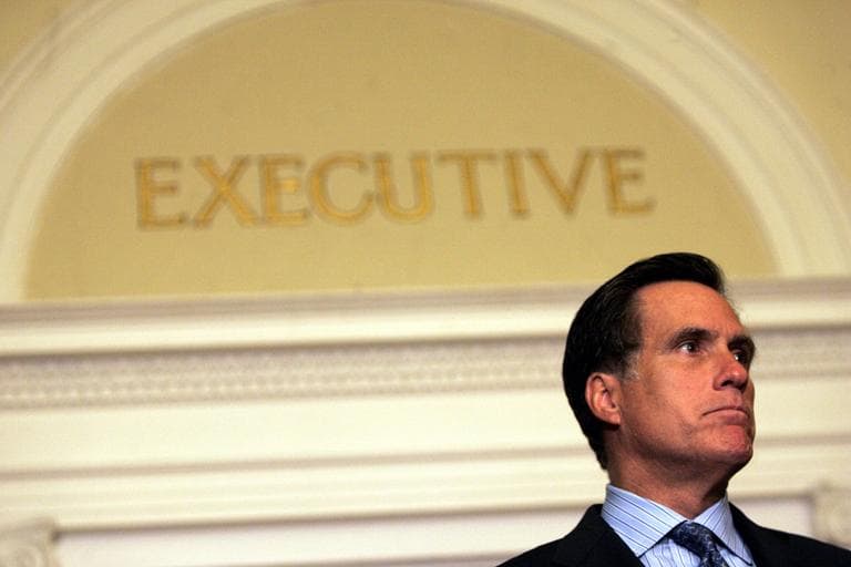 Then-Gov. Mitt Romney speaks to reporters in front of his office at the State House in Boston on July 27, 2006, about the resignation of Mass. Turnpike Authority chairman Matt Amorello after a ceiling panel killed a motorist in a Big Dig highway tunnel. (AP)