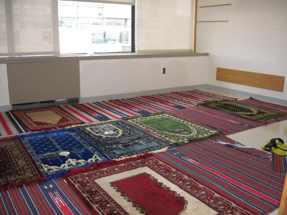 A patient room at Spaulding has been converted into a Muslim prayer room for Libyan patients. (Sacha Pfeiffer/WBUR)