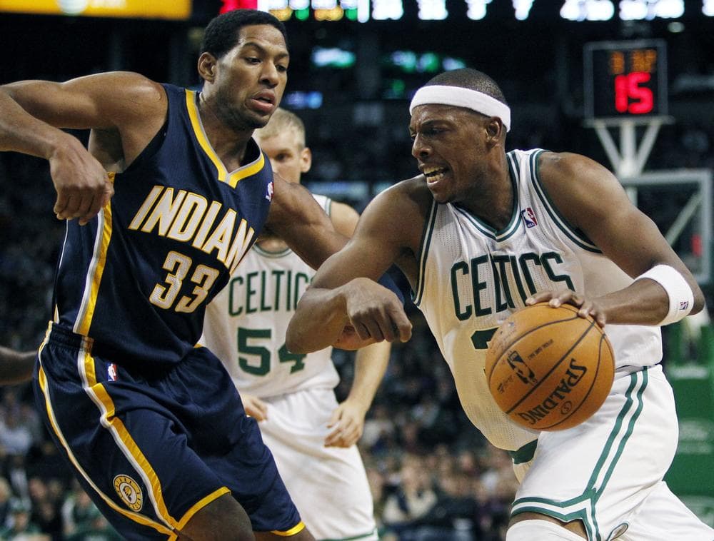 Paul Pierce, right, drives past Indiana Pacers' Danny Granger in the third quarter of the game last night. The Pacers won 87-74. 