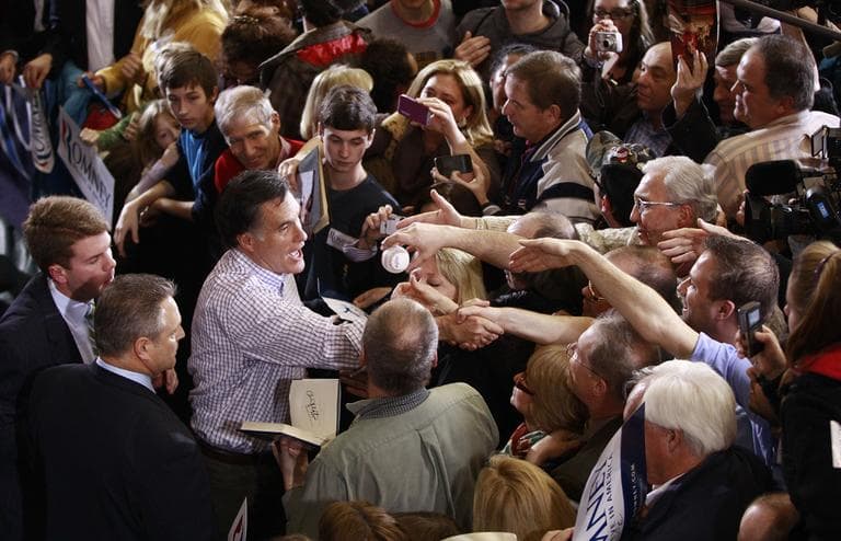 Republican presidential candidate, former Massachusetts Gov. Mitt Romney, campaigns at Exeter High School in Exeter, N.H., Sunday, Jan. 8, 2012. (AP)