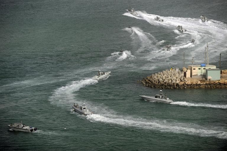 Iranian navy speed boats attend a drill in the sea of Oman, on Friday, Dec. 30, 2011. Iran's navy chief has reiterated for a second time in less than a week that his country can easily close the strategic Strait of Hormuz at the mouth of the Persian Gulf, the passageway through which a sixth of the world's oil flows. (AP)