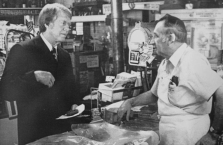 Jimmy Carter meets Lloyd Robie during Carter&#039;s 1976 campaign for President in Hooksett, N.H. Carter was known to sleep at resident&#039;s houses and carry his own bag. (AP)