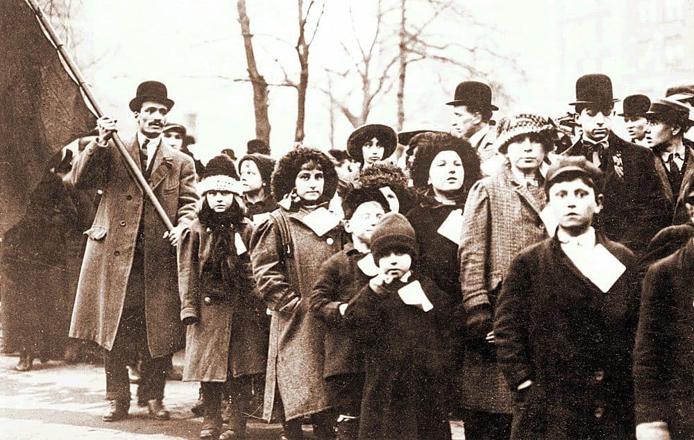 Workers and their families rallied in 1912 during the Bread and Roses strike. (Courtesy: Bread and Roses Centennial Exhibit)