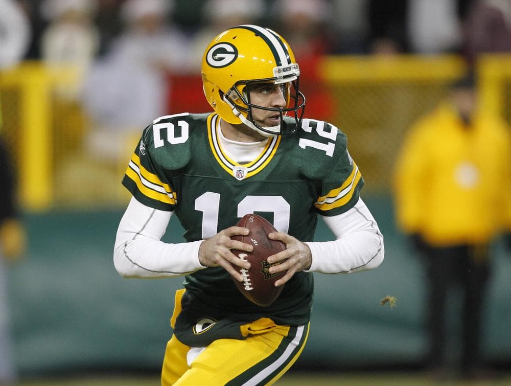 Can Aaron Rodgers and the Packers hold off Eli Manning and the Giants? (AP)