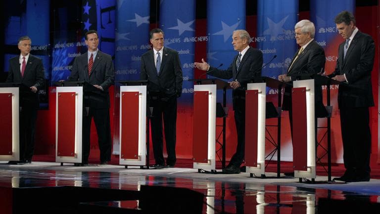 Rep. Ron Paul, R-Texas, center right, answers a question as former Utah Gov. Jon Huntsman, former Pennsylvania Sen. Rick Santorum, former Massachusetts Gov. Mitt Romney, former House Speaker Newt Gingrich and Texas Gov. Rick Perry (L-R) during a Republican presidential candidate debate at the Capitol Center for the Arts in Concord, N.H., Sunday, Jan. 8, 2012. (AP)