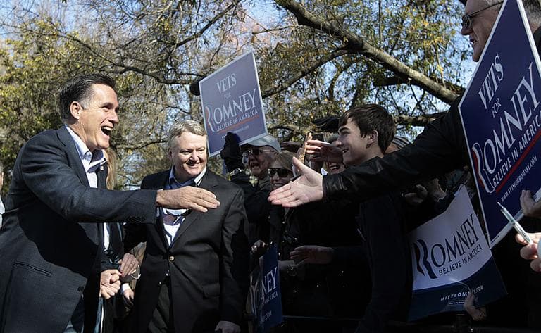 Republican presidential candidate, former Massachusetts Gov. Mitt Romney, left, accompanied by South Carolina State Treasurer Curtis Loftis, second from left, campaigns in Spartanburg, S.C. on Wednesday. (AP)