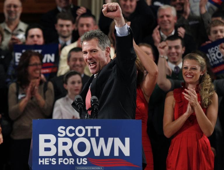 Sen. Scott Brown pumps his fist during his re-election campaign kick-off in Worcester Thursday. (AP)