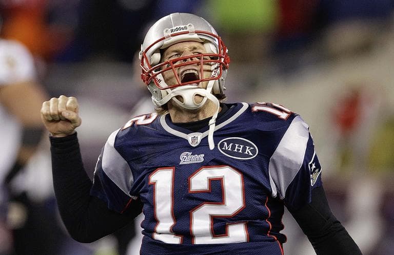 Patriots quarterback Tom Brady celebrates after scoring a one yard touchdown during the second half of the AFC Championship NFL football game against the Baltimore Ravens on Sunday. (AP)