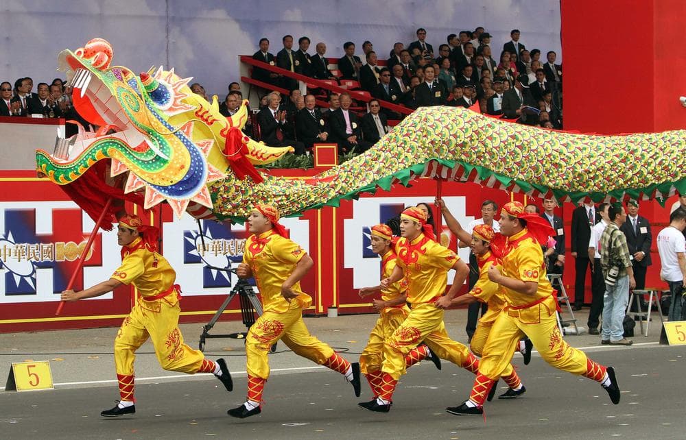 Dragon dance performers in Taipei, Taiwan in October. (AP/Chiang Ying-ying)