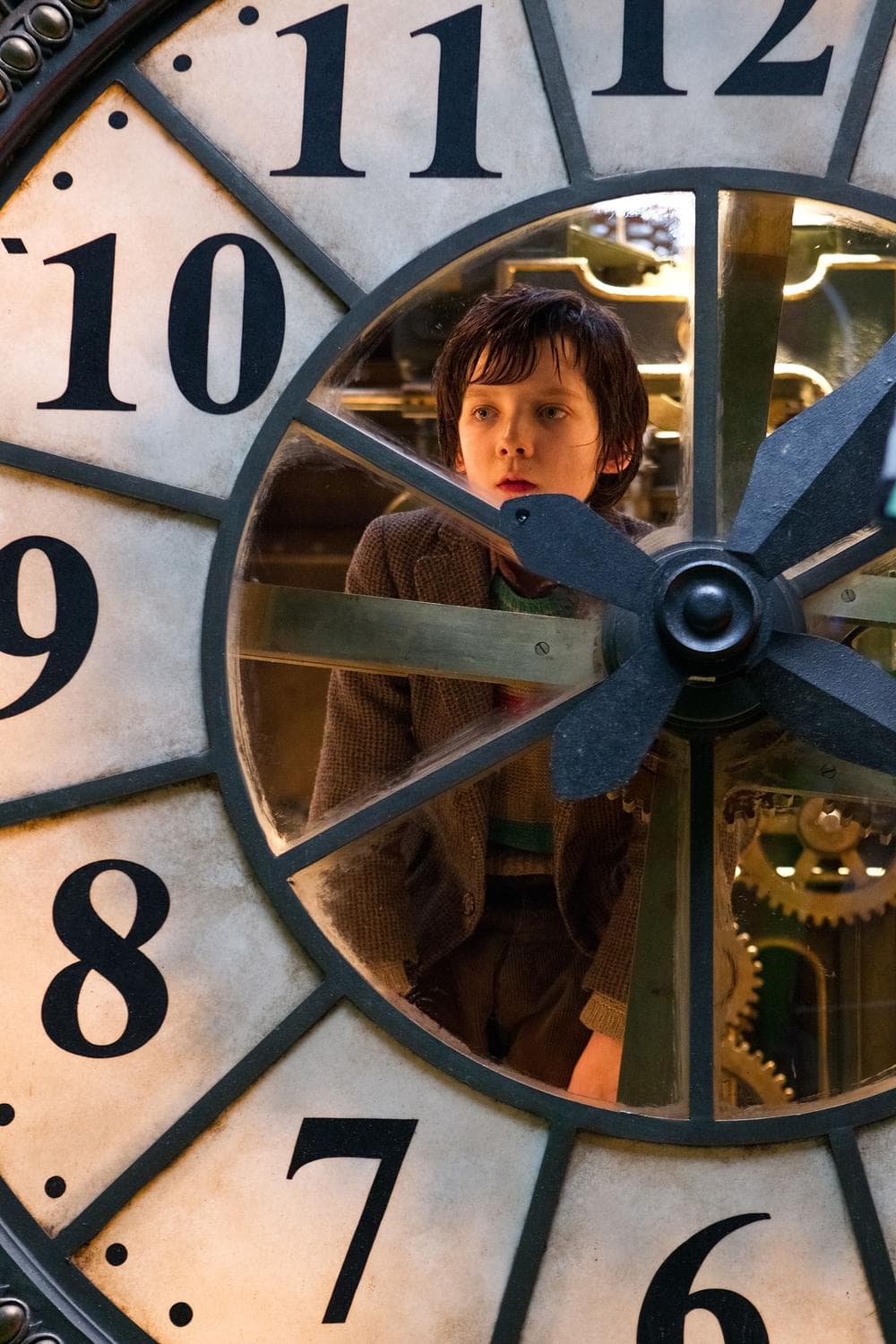 Asa Butterfield portrays Hugo Cabret in a scene from &quot;Hugo.&quot; (AP/Paramount Pictures)