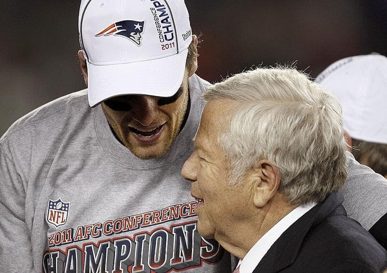 Tom Brady, left, shakes hands with New England Patriots owner Robert Kraft after their AFC Championship win over the Baltimore Ravens. (AP)