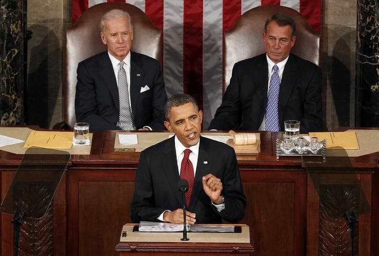 President Barack Obama gestures while giving his State of the Union address on Capitol Hill in Washington, Tuesday, Jan. 24, 2012. Vice President Joe Biden and House Speaker John Boehner of Ohio listen at rear.  (AP)