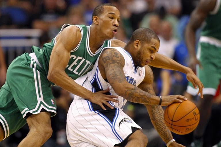 Orlando Magic&#039;s Jameer Nelson, right, drives past Boston Celtics&#039; Avery Bradley during the first half of an NBA basketball game on Thursday, in Orlando, Fla. (AP)