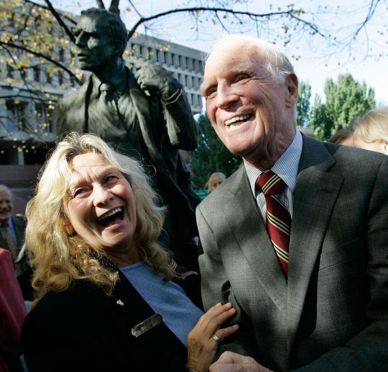 Former Mayor Kevin White laughs with supporter Marie Ostiguy after the unveiling of a bronze statue bearing White's likeness outside Faneuil Hall near Quincy Market on Nov. 1, 2006. (AP)