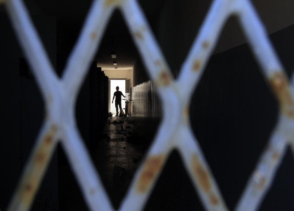 A man walks inside a prison in Tripoli, Libya. (AP)