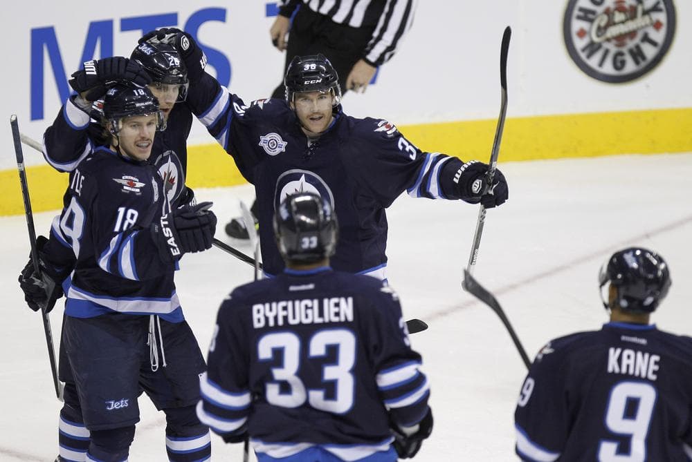 The Winnipeg Jets wouldn&#039;t make the playoffs if the postseason started today, but Helene Elliott says having them back in the league is a win for the NHL. (AP)