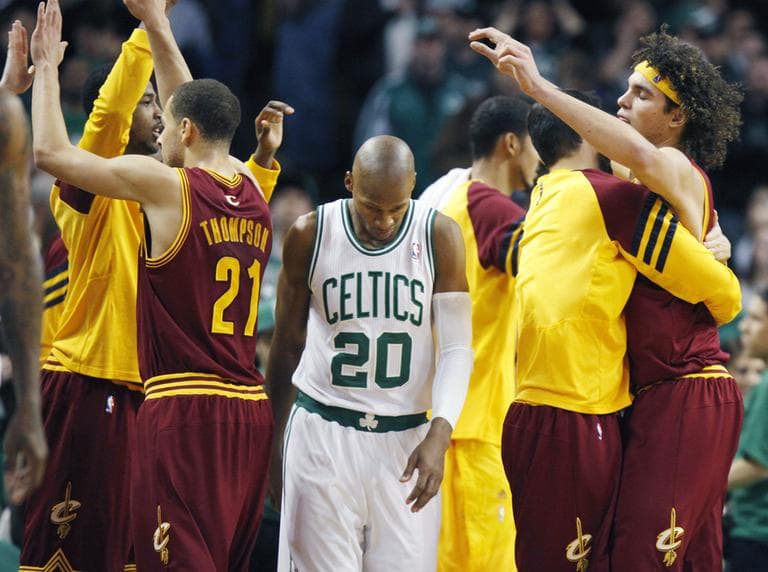 Boston Celtics&#039; Ray Allen heads off the court as the Cleveland Cavaliers Anderson Varejao, right, and Mychel Thompson celebrate the Cavaliers&#039; 88-87 win in Boston, Sunday. (AP)