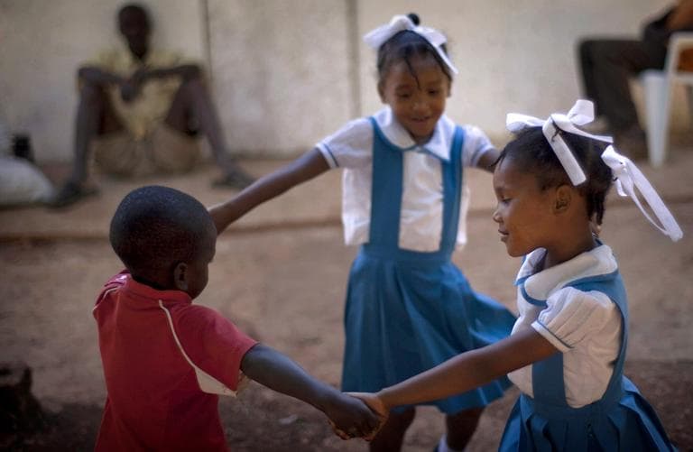 In this photo taken on Jan. 17, Soraya, 5, right, and her sister Leila Laurentus, 6, center, play with a friend in Calebasse, on the outskirts of Port-au-Prince, Haiti. The sisters were among 33 children who U.S. missionaries tried to take out of Haiti after the Jan. 12, 2010 earthquake and were reunited with their parents in March 2010. (AP)