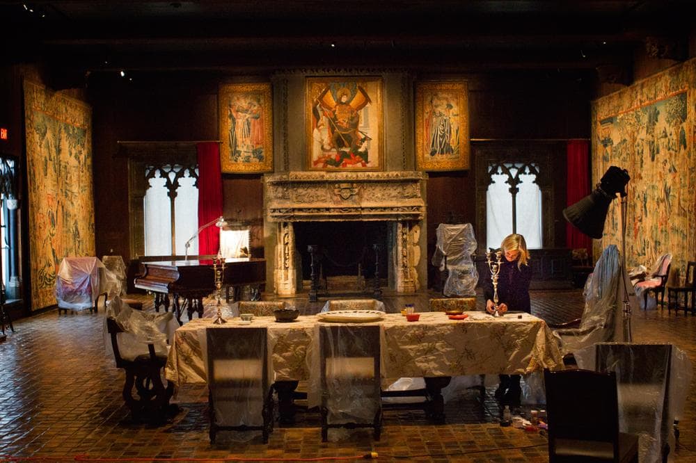 Final preparations are made in the Isabella Stewart Gardner's Tapestry Room. At right is Valentine Talland, the room's objects conservator. (Jesse Costa/WBUR)
