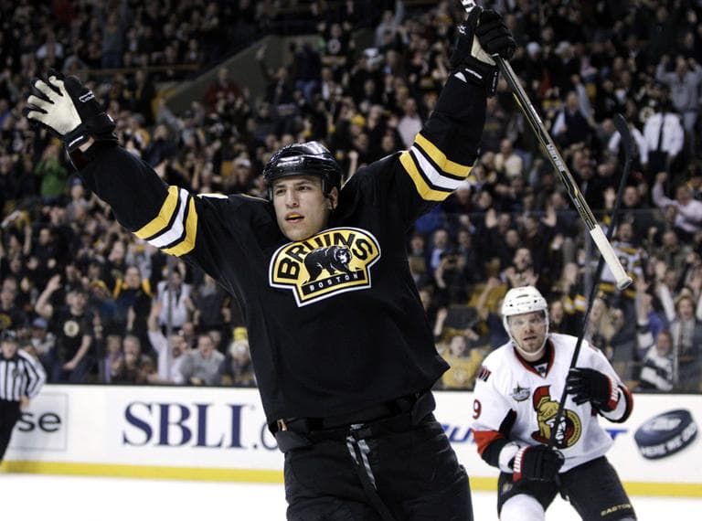 Boston Bruins left wing Milan Lucic celebrates his goal in the second period of an NHL hockey game in Boston, Tuesday. (AP)