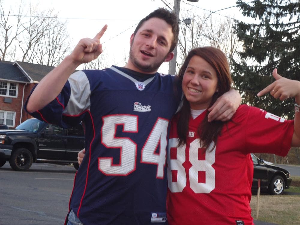 New York Giants fan Tracy Hicks (right) and her boyfriend, Patriots fan Eric Bartholomew. (Courtesy of Hicks and Bartholomew)