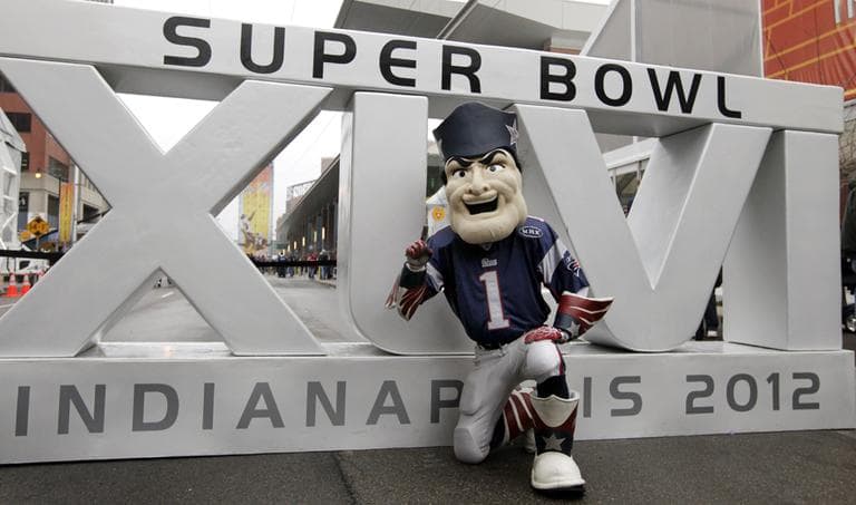 New England Patriots football team mascot, Pat Patriot, poses at Super Bowl Village in Indianapolis. (AP)