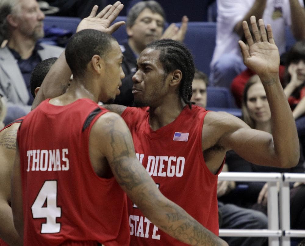 Malcolm Thomas (l) and Kawhi Leonard have moved on to the NBA, but the San Diego State Aztecs remains among the top teams in the nation. (AP)