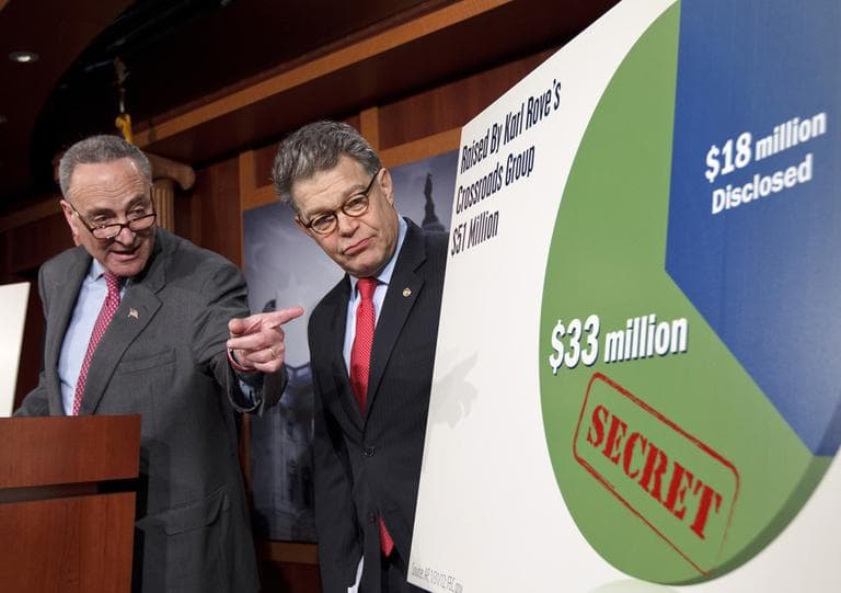 Sen. Charles Schumer, D-NY, left, accompanied by Sen. Al Franken, D-Minn., speaks during a news conference on Capitol Hill in Washington, Wednesday, Feb. 1, 2012, to discuss the disclosure of super PAC donors to the Republican presidential candidates. (AP)