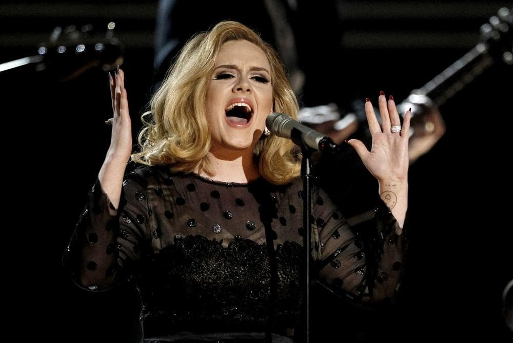 Adele performs during the 54th annual Grammy Awards in Los Angeles last night. (AP Photo)