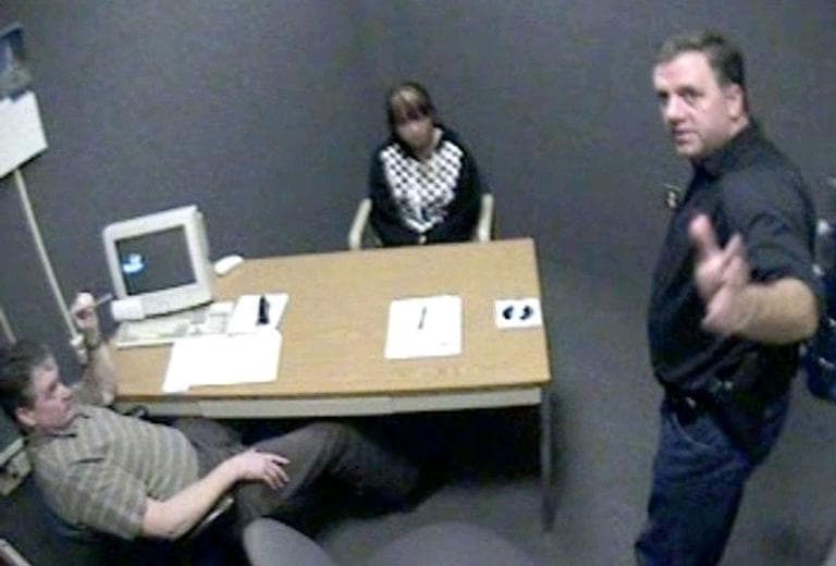 Worcester Police Sgt. Kevin Pageau, right, and Detective John Doherty, left, interrogate Nga Truong, 16, following the 2008 death of her baby boy. (WBUR screenshot)